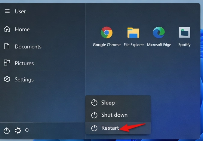 Windows Start menu showing Restart option highlighted with red arrow